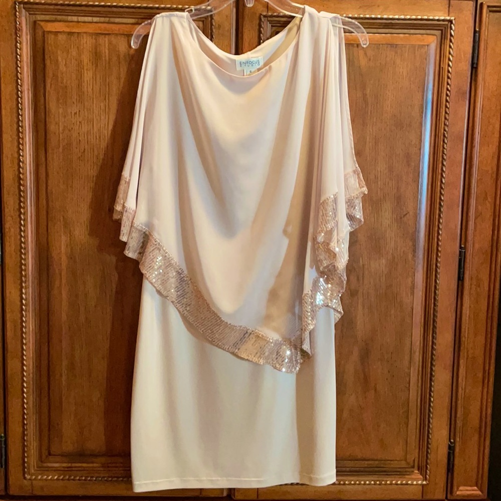 Soft, polyester dress with sheer sequin accent